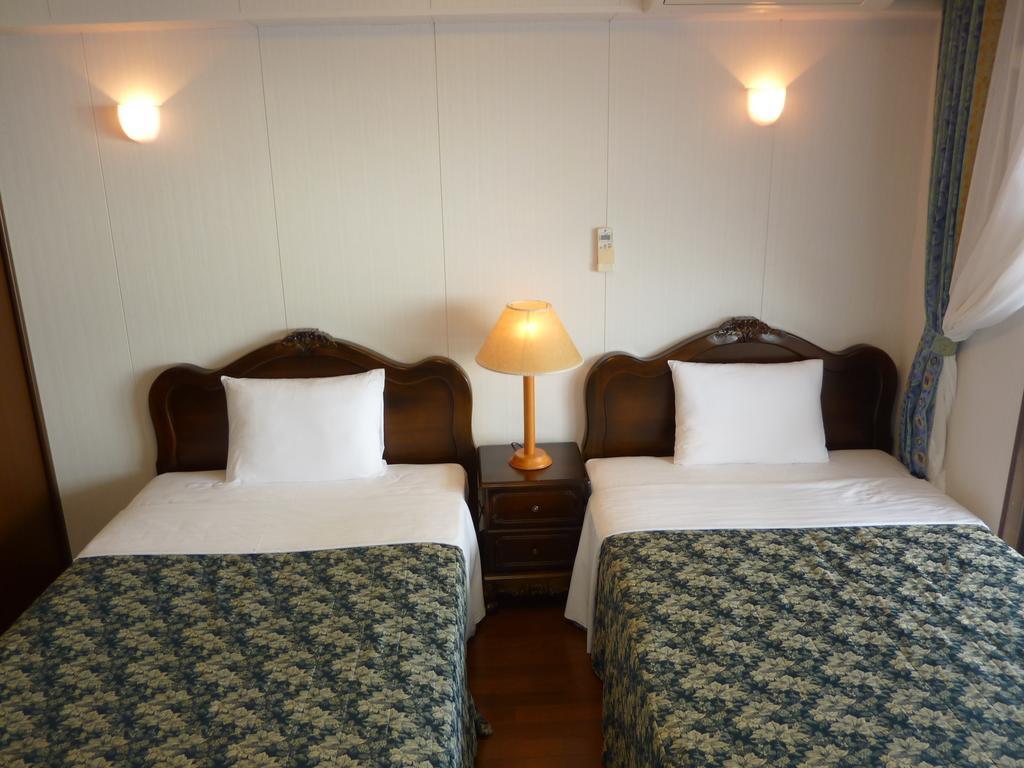 Morimar Resort Hotel Yomitan Quarto foto