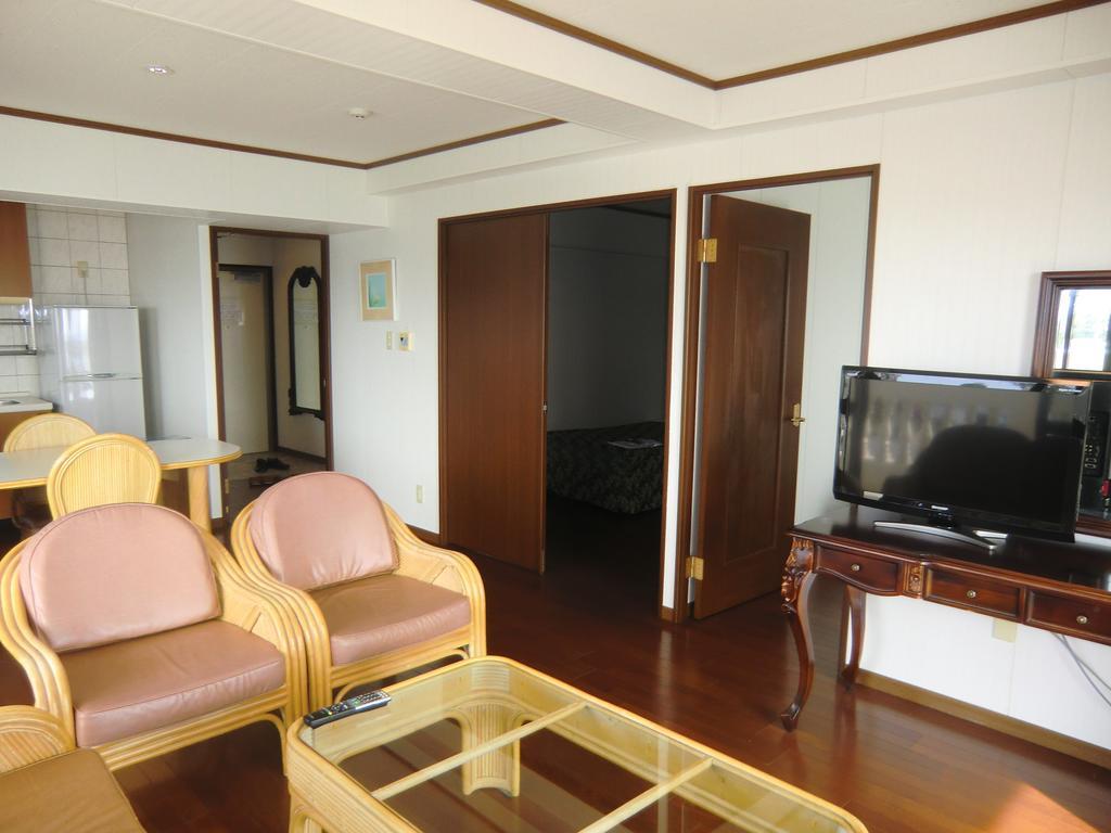Morimar Resort Hotel Yomitan Quarto foto