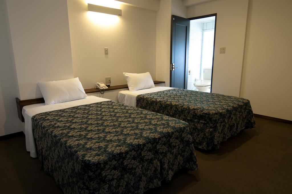 Morimar Resort Hotel Yomitan Quarto foto
